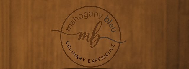 Logo of Mahogany Bleu Culinary Experience with elegant typography.
