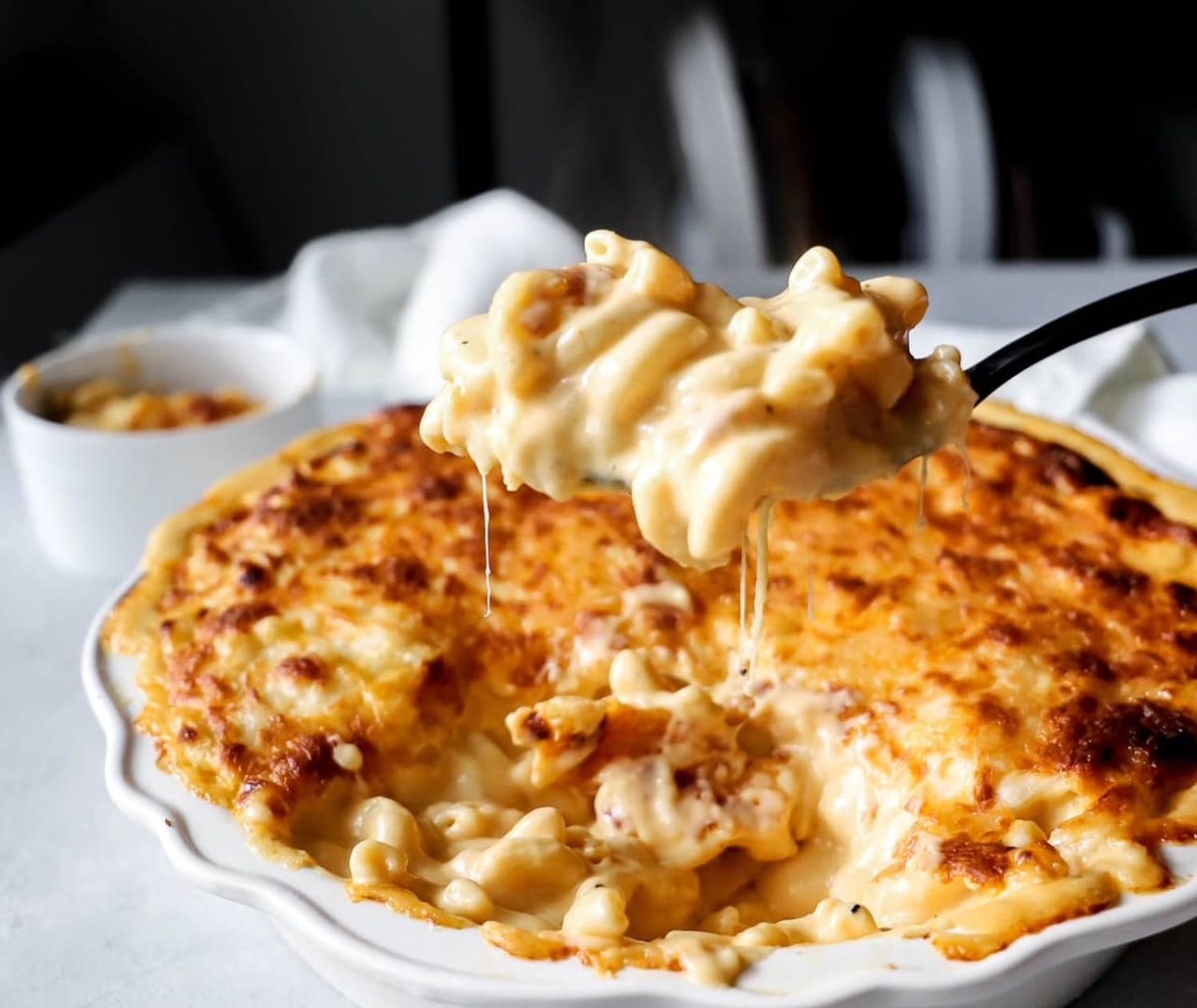 Creamy macaroni and cheese topped with golden, crispy breadcrumbs.