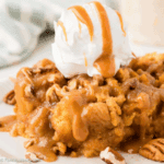 Dessert with caramel drizzle and whipped cream.