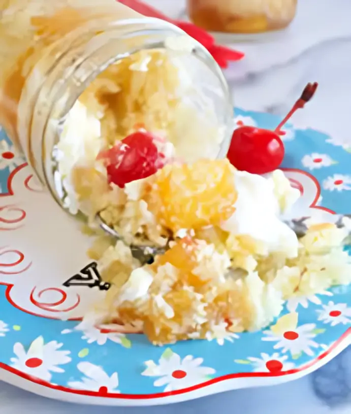 Dessert spilled from jar onto floral plate.