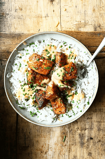 Spiced salmon with rice and herbs.