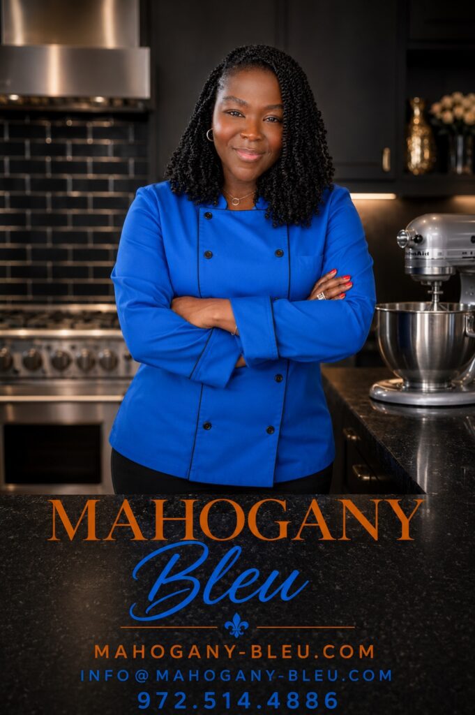 Smiling chef in blue coat in kitchen